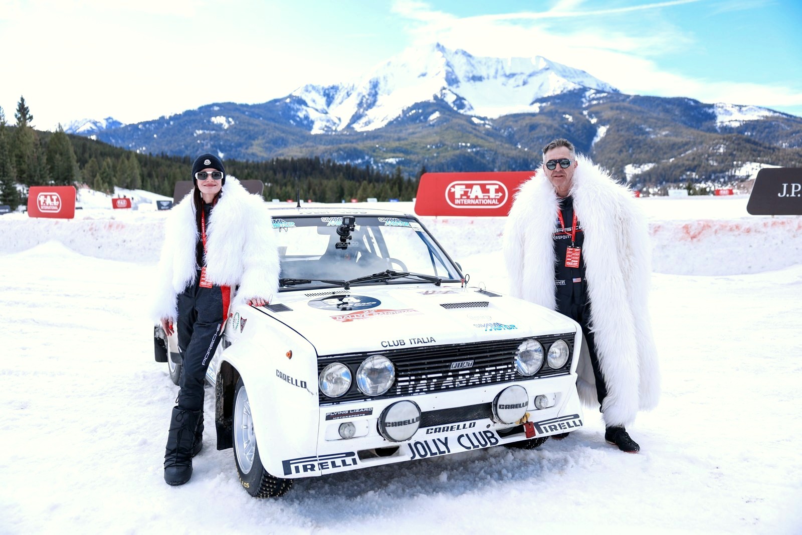 The team flanking the Fiat 131 Abarth below the Big Sky peaks, F.A.T. Ice Race 2026