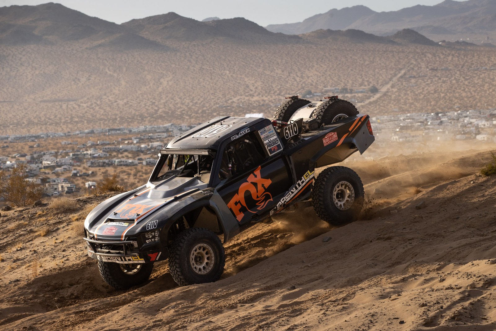 Brenthel trophy truck No. 6110 racing through Johnson Valley, King of the Hammers 2025