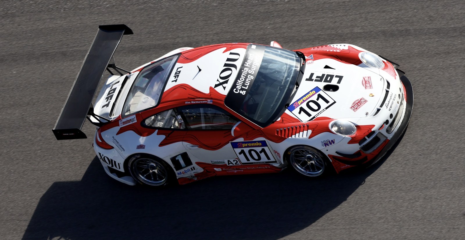 Porsche 911 GT3 R No. 101 cresting the COTA rise, Masters Endurance Legends COTA 2022