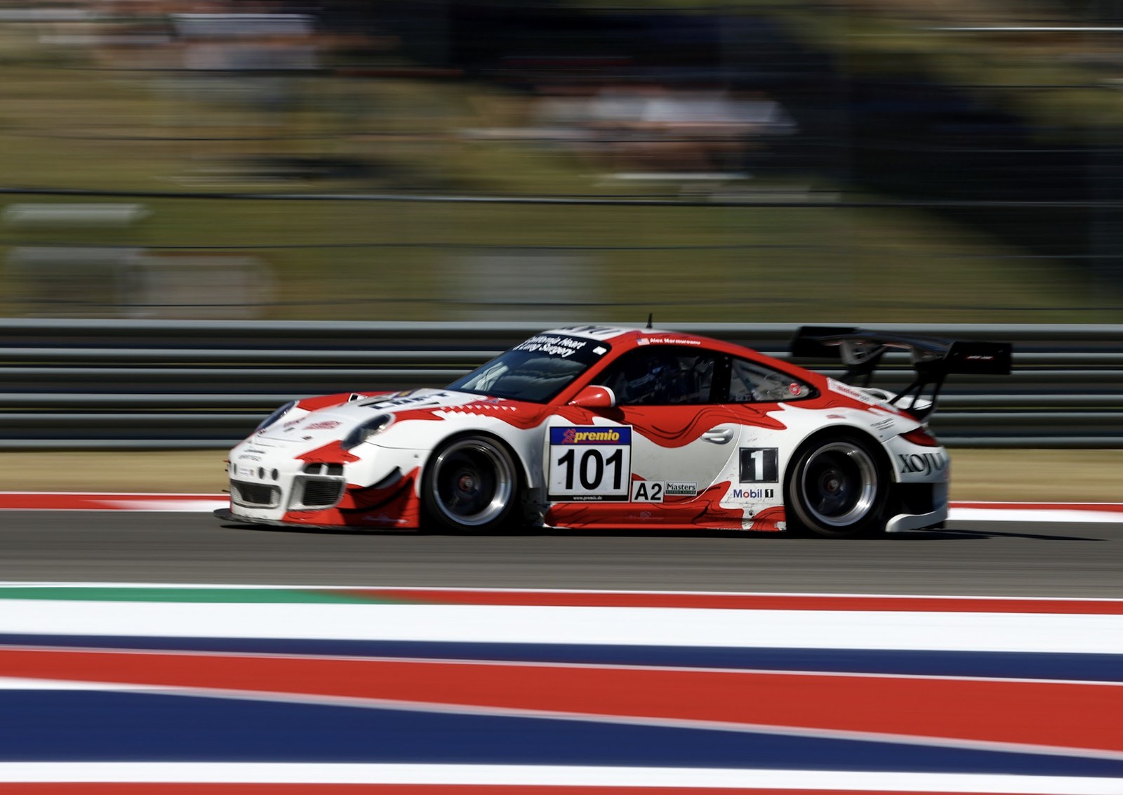 Porsche 911 GT3 R No. 101 on the back straight, Masters Endurance Legends COTA 2022