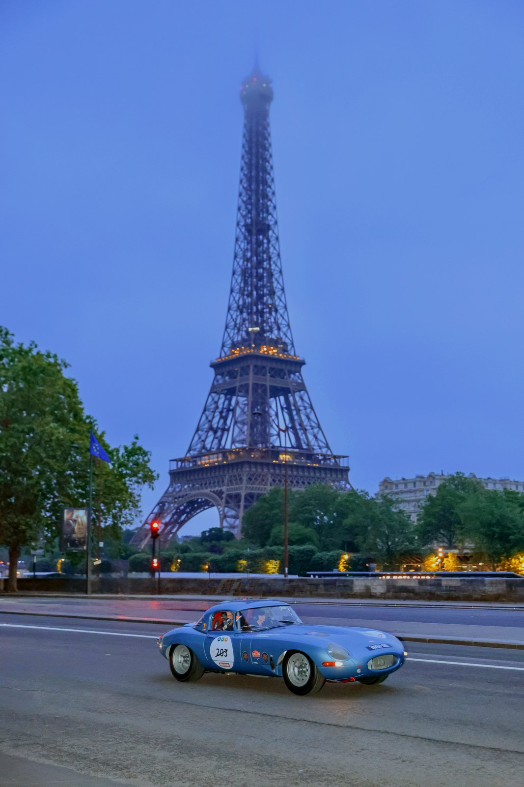 Jaguar E-Type No. 203 past the Eiffel Tower at dawn, Tour Auto 2026