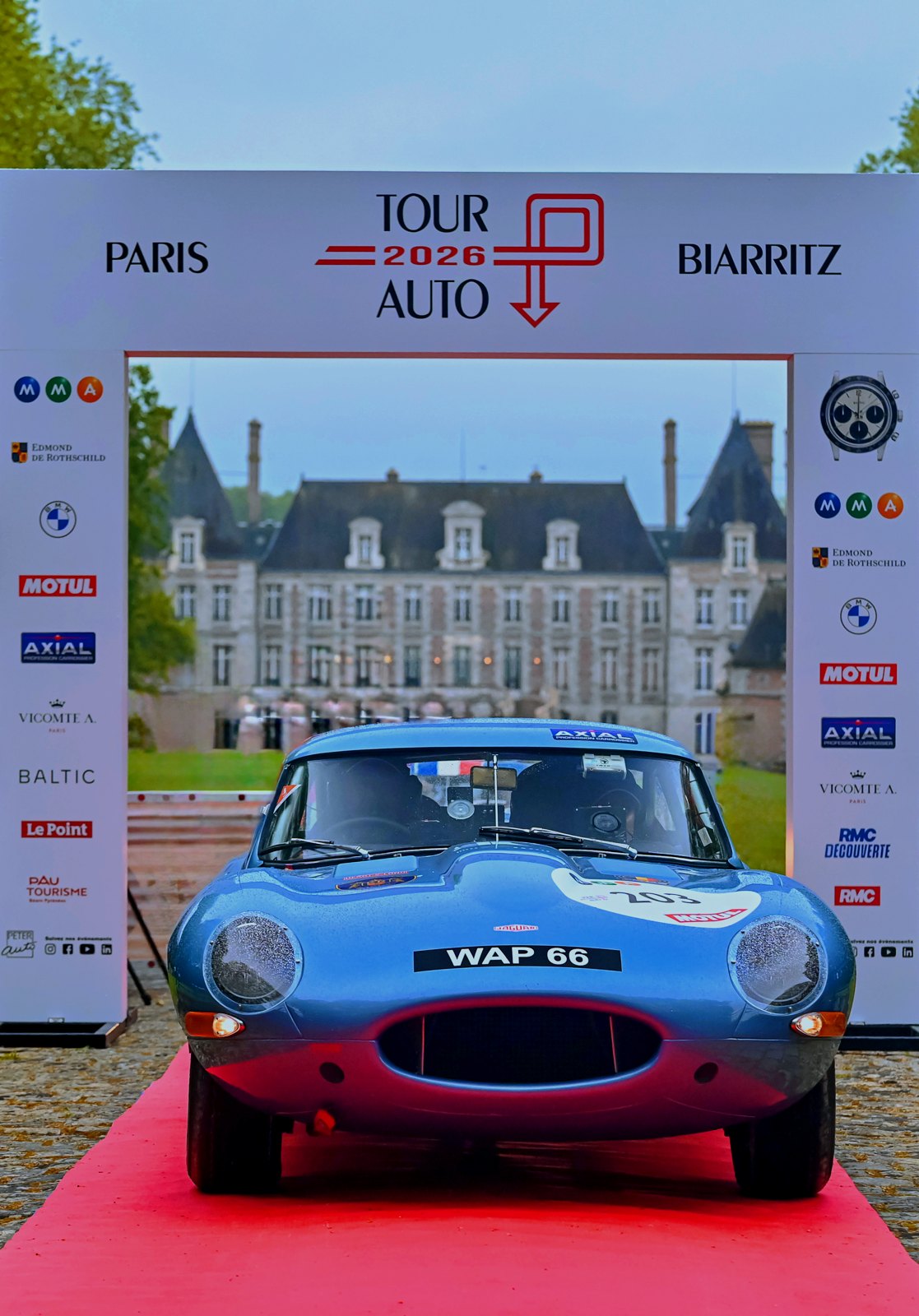 Jaguar E-Type No. 203 at the Tour Auto 2026 start arch