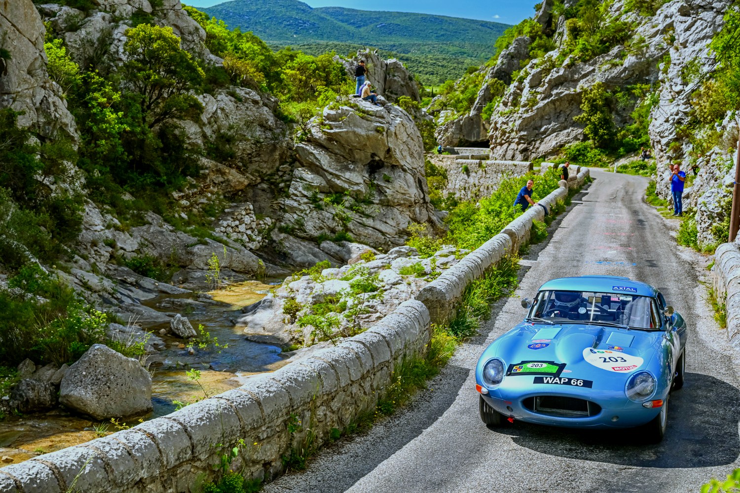 Jaguar E-Type No. 203 through a gorge stage, Tour Auto 2026